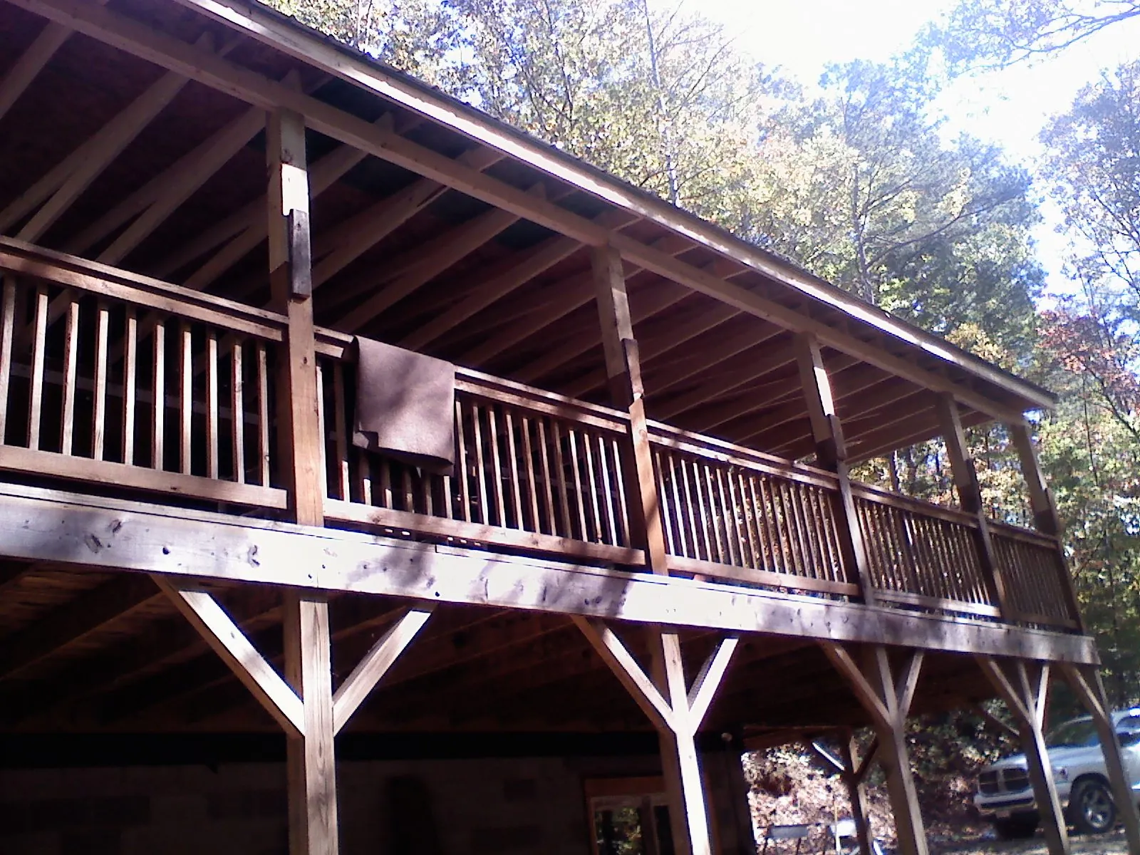 Timber framing under a new elevated porch and deck — Roof Leak Repair in West Boylston by Roofing Brothers